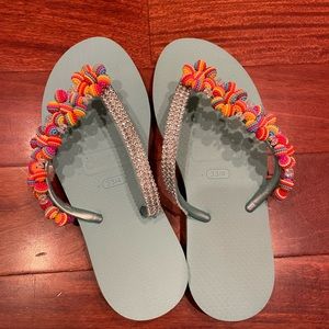 New beautifully detailed flip flops